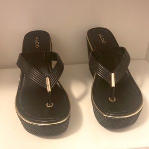 ALDO black  with gold trim wedge sandals